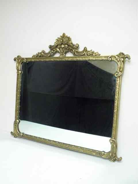 Appraisal: Victorian style gilt wall mirror Plaster design over wood back