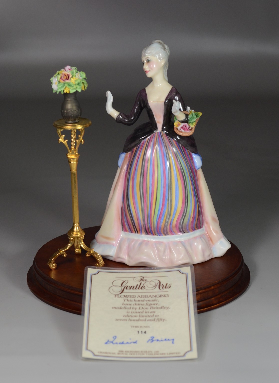 Appraisal: Royal Doulton Flower Arranging bone china figurine The Gentle Arts