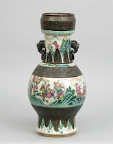 Appraisal: A Chinese Carved and Glazed Porcelain Vase A Chinese ceramic