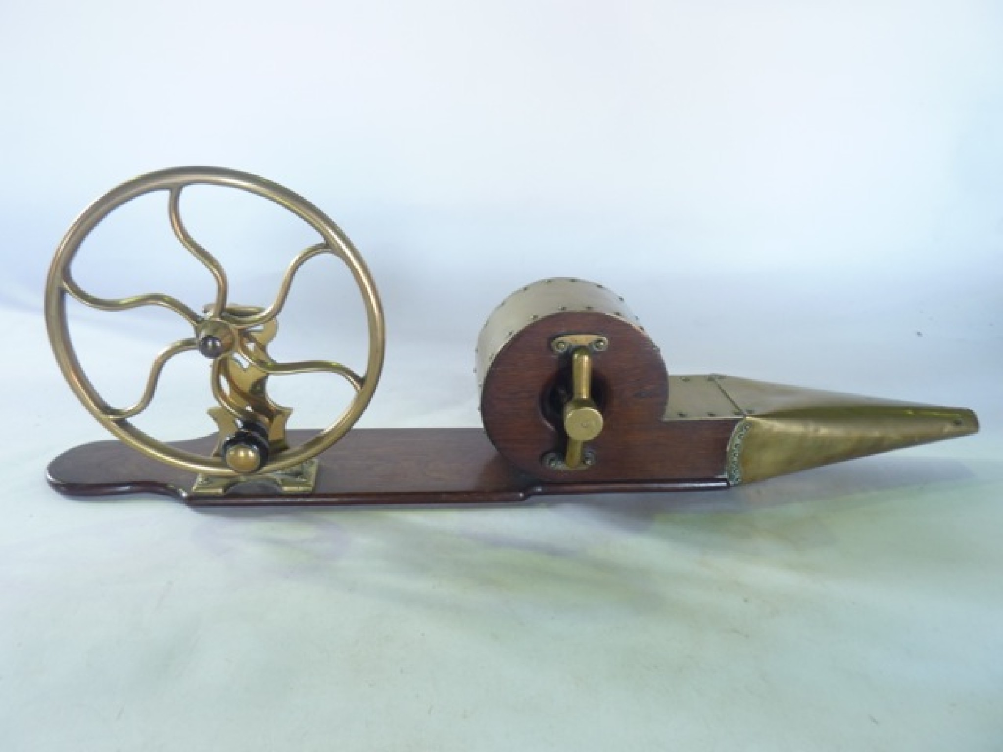 Appraisal: A good quality th century stationary bellows assembly principally in