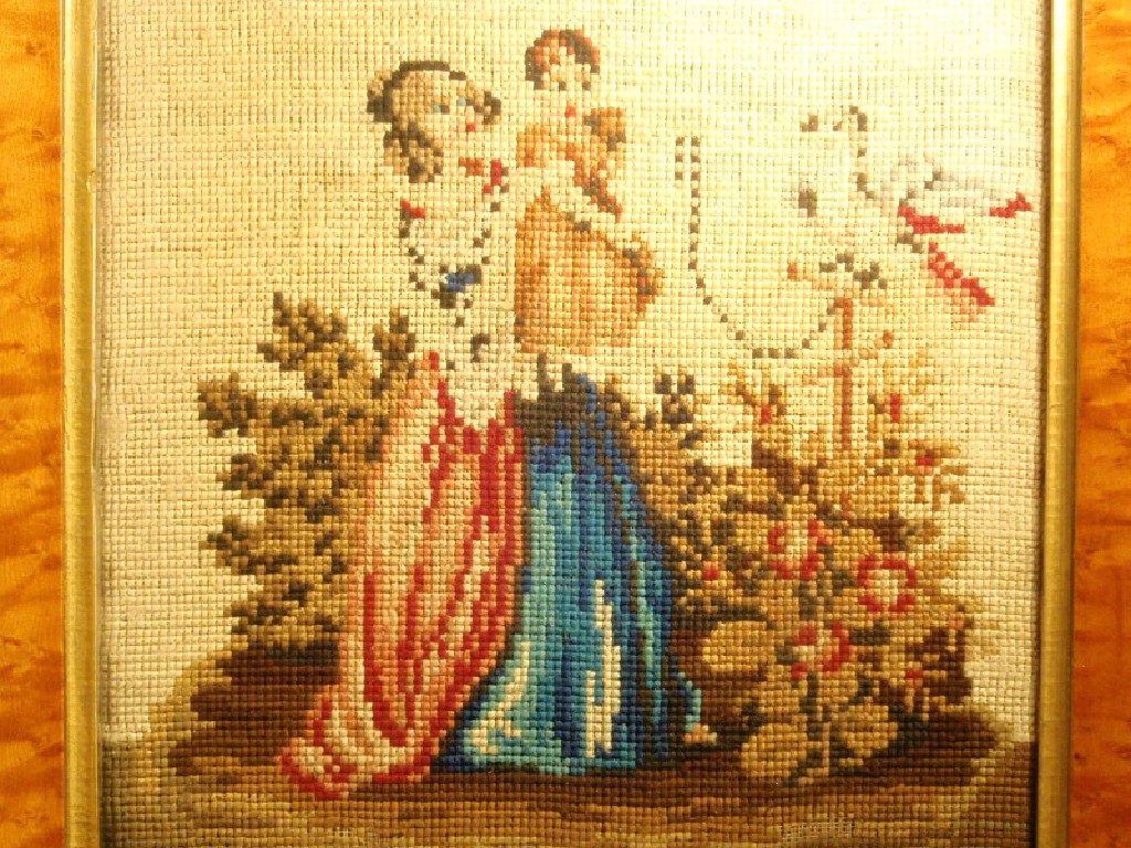 Appraisal: A Victorian wool needlework picture of a lady holding an