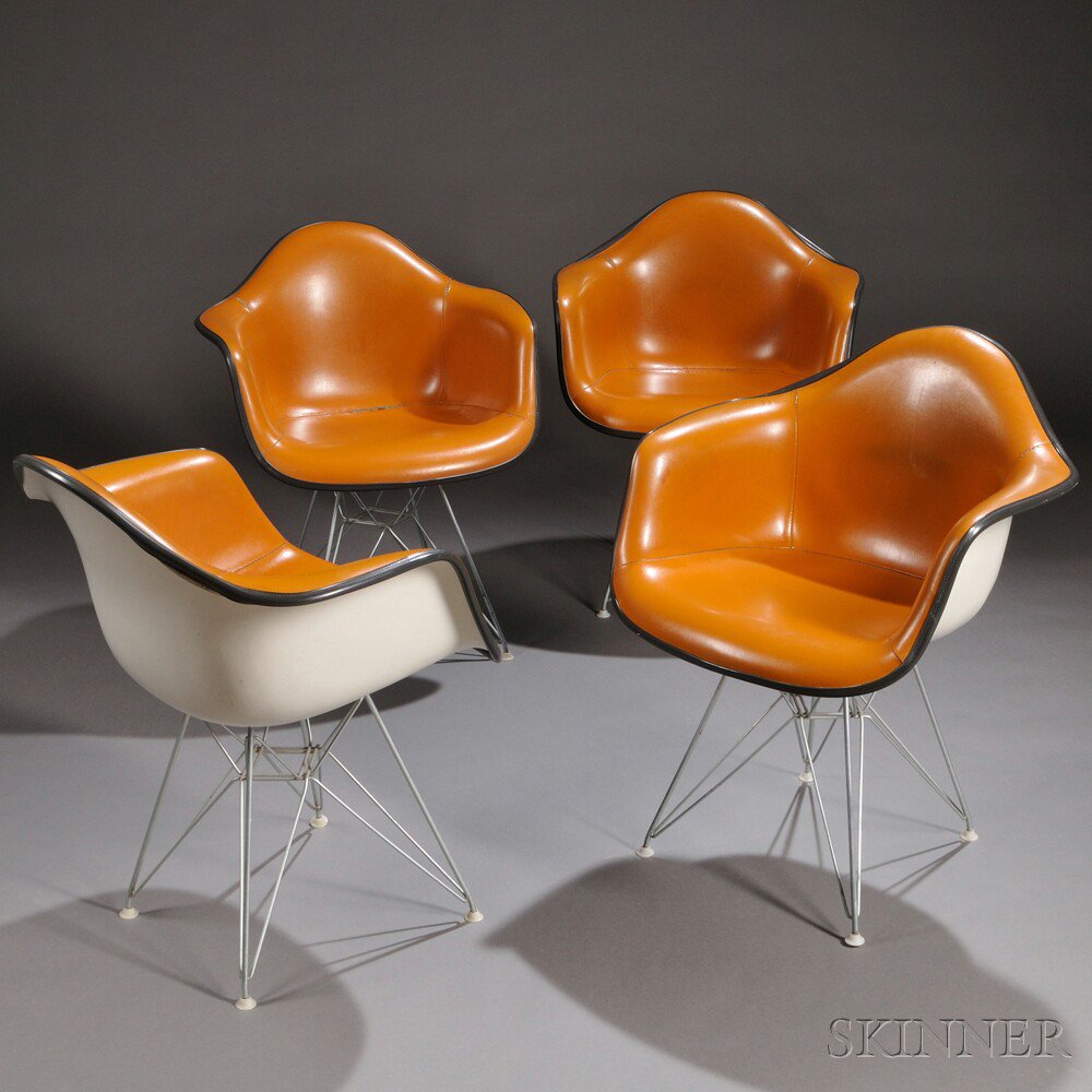 Appraisal: Four Eames Chairs Eiffel Tower Base Fiberglass and welded steel