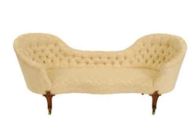 Appraisal: A Victorian double chair back settee with later button back