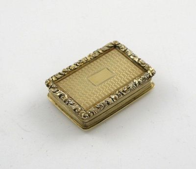 Appraisal: A William IV silvergilt vinaigrette with a raised foliate border