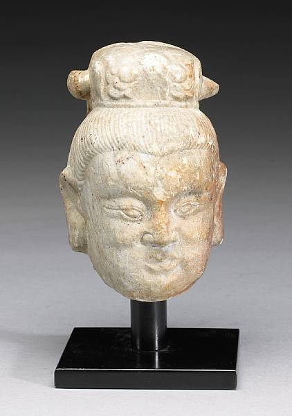 Appraisal: A small carved marble male head Ming Dynasty His corpulent