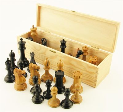 Appraisal: A 'Staunton' type boxwood and ebony weighted chess set rooks