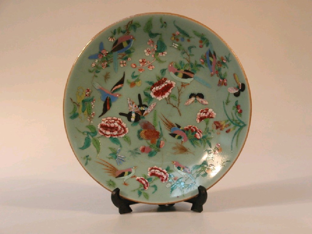 Appraisal: A Chinese celadon plate painted in famille rose enamels with