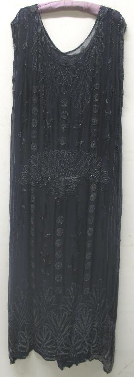 Appraisal: A th century full length dark blue crepe evening dress