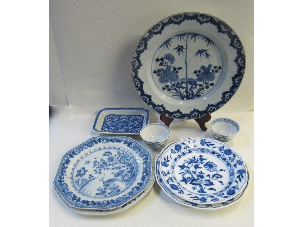 Appraisal: Four Meissen blue and white plates and transfer printed plate