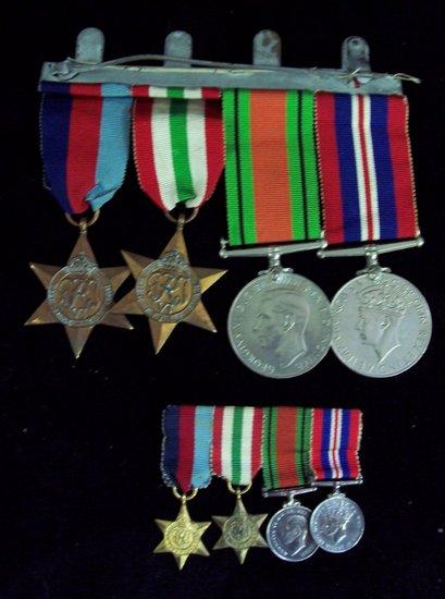 Appraisal: A WWII group of medals The Defence Medal The War