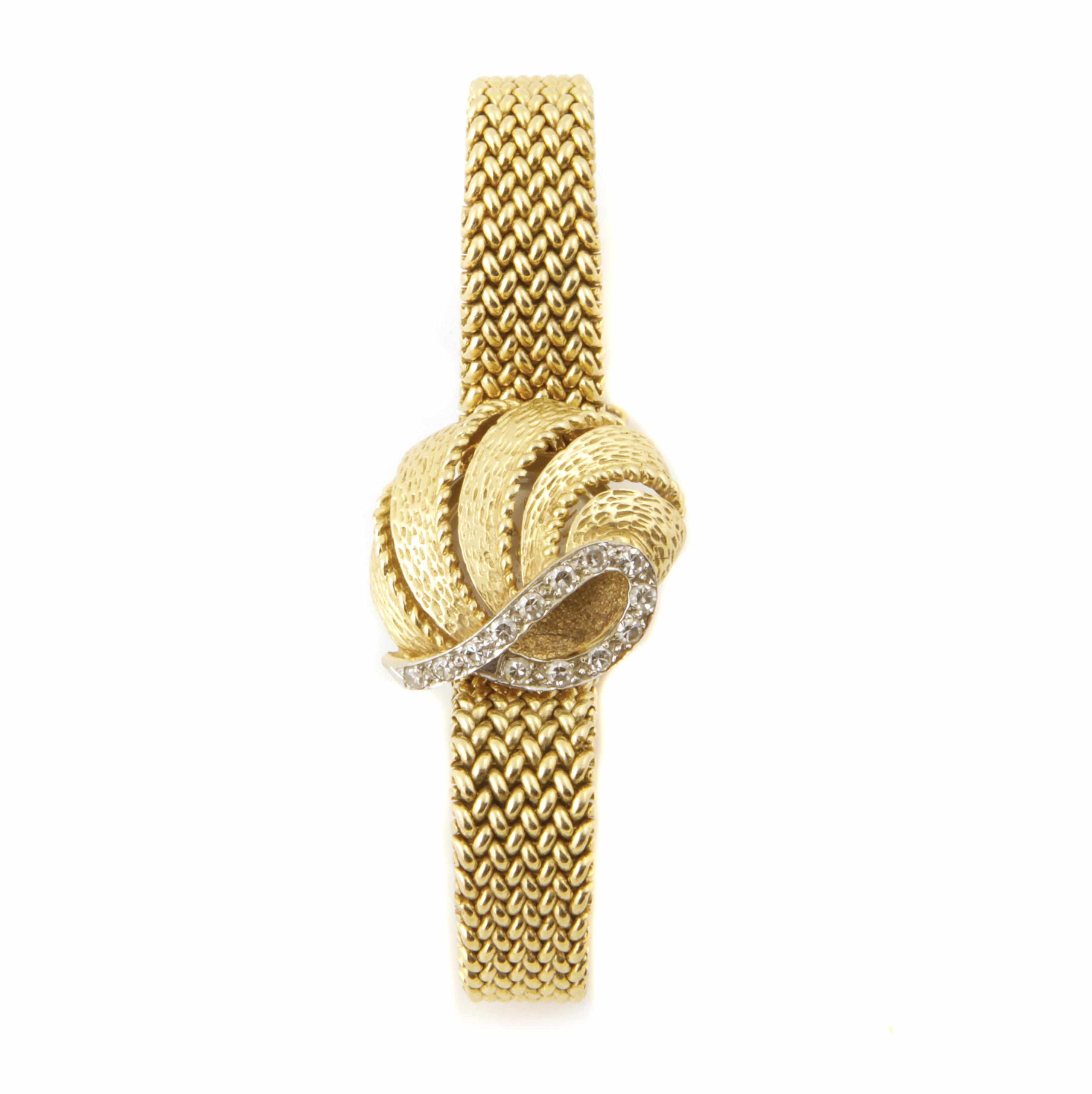 Appraisal: A lady's diamond and gold covered dial mesh bracelet wristwatch