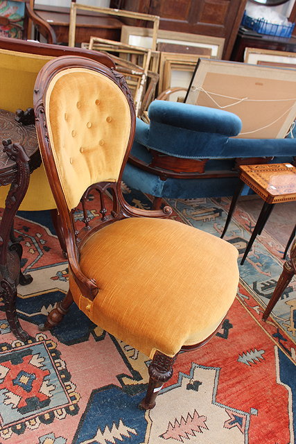 Appraisal: A VICTORIAN MAHOGANY FRAMED GOLD DRALON UPHOLSTERED LOW CHAIR together