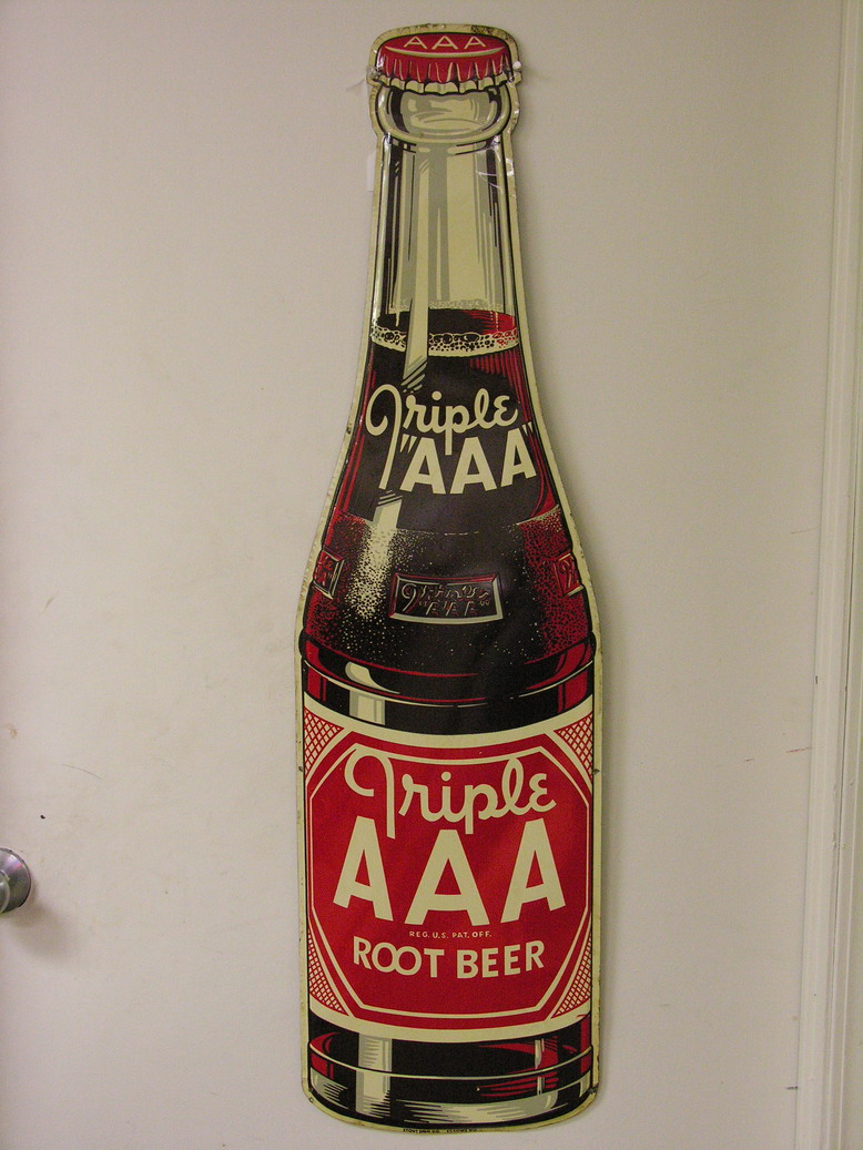 Appraisal: TRIPLE AAA ROOT BEER DIE CUT EMBOSSED BOTTLE SIGN Stout