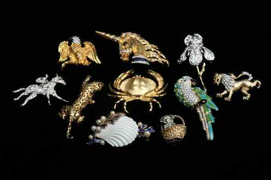 Appraisal: TEN SIGNED COSTUME JEWELRY PINS IN FORMS OF ANIMALS FLOWERS