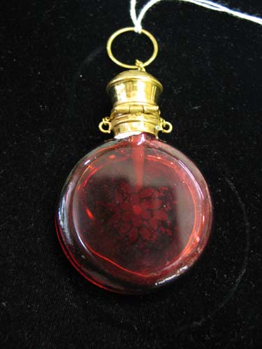 Appraisal: AN AMERICAN VICTORIAN RED GLASS SCENT BOTTLE hand enameled with