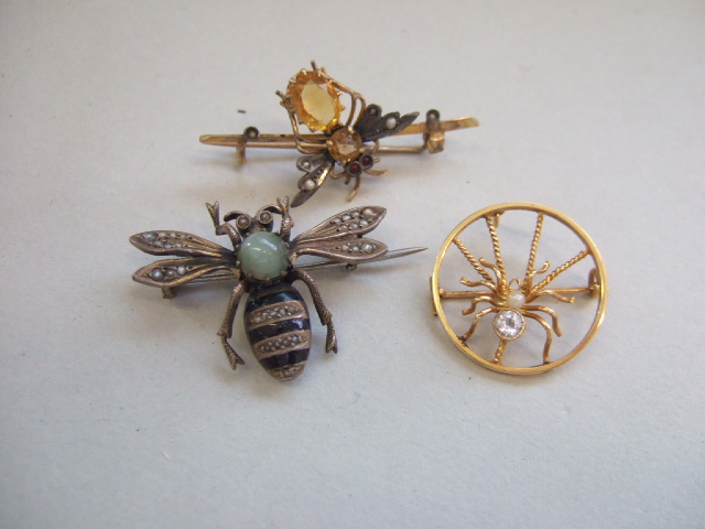 Appraisal: Two gem set brooches designed as winged insects and a