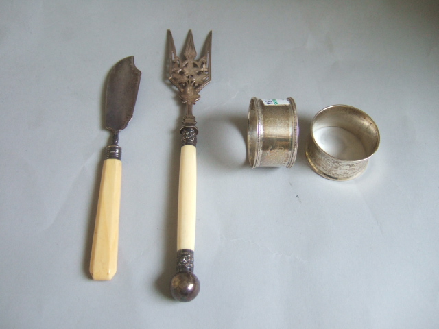 Appraisal: A silver bread fork pierced and engraved with foliate motifs