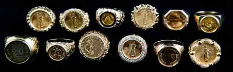 Appraisal: COLLECTION OF TWELVE GOLD COIN INSET RINGS