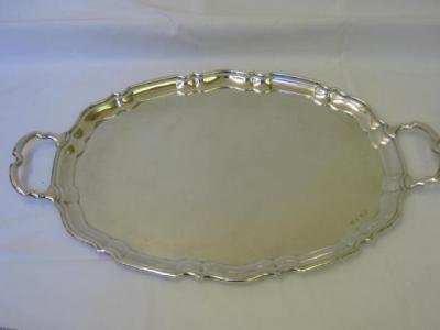 Appraisal: A TEA TRAY of oval form with Chippendale moulded border