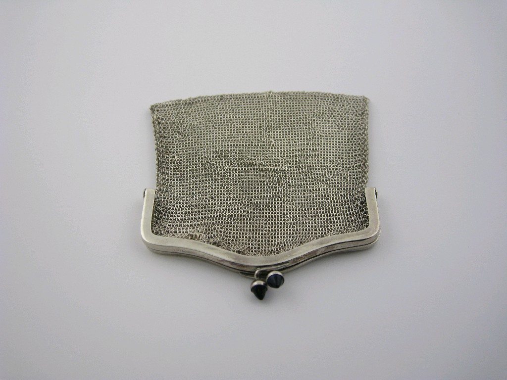 Appraisal: A Chain Link Purse with silver frame and two sapphire