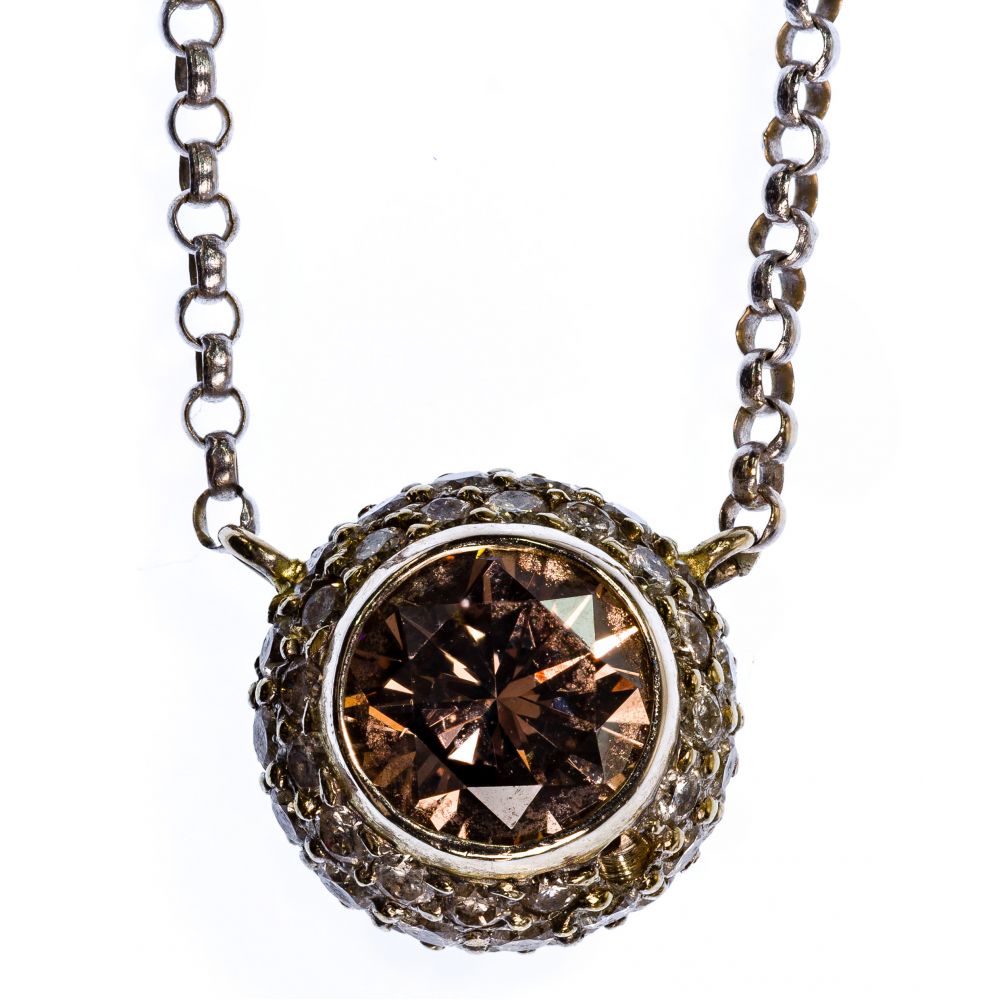 Appraisal: K WHITE GOLD AND DIAMOND PENDANT ON NECKLACEBall pendant having