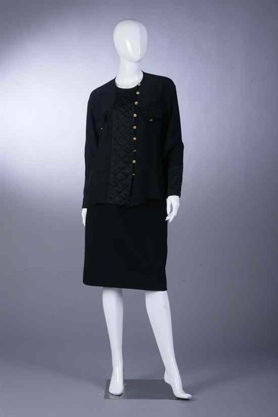 Appraisal: CHANEL BLACK BLOUSE AND SKIRT SET Blouse with quilted silk