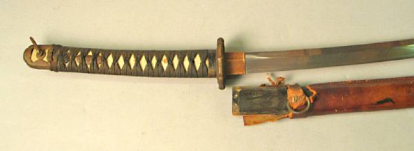 Appraisal: A Japanese shin-gunto officer's sword Signed inch blade Hilt with