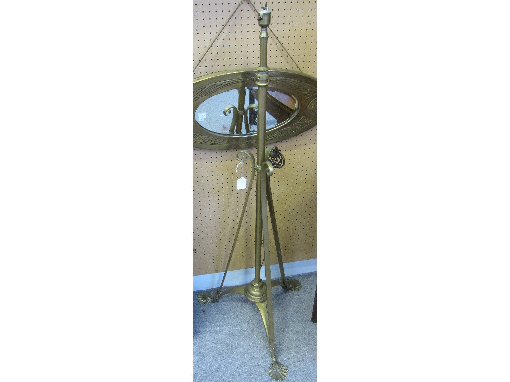 Appraisal: Lot comprising brass framed mirror and a brass floor lamp