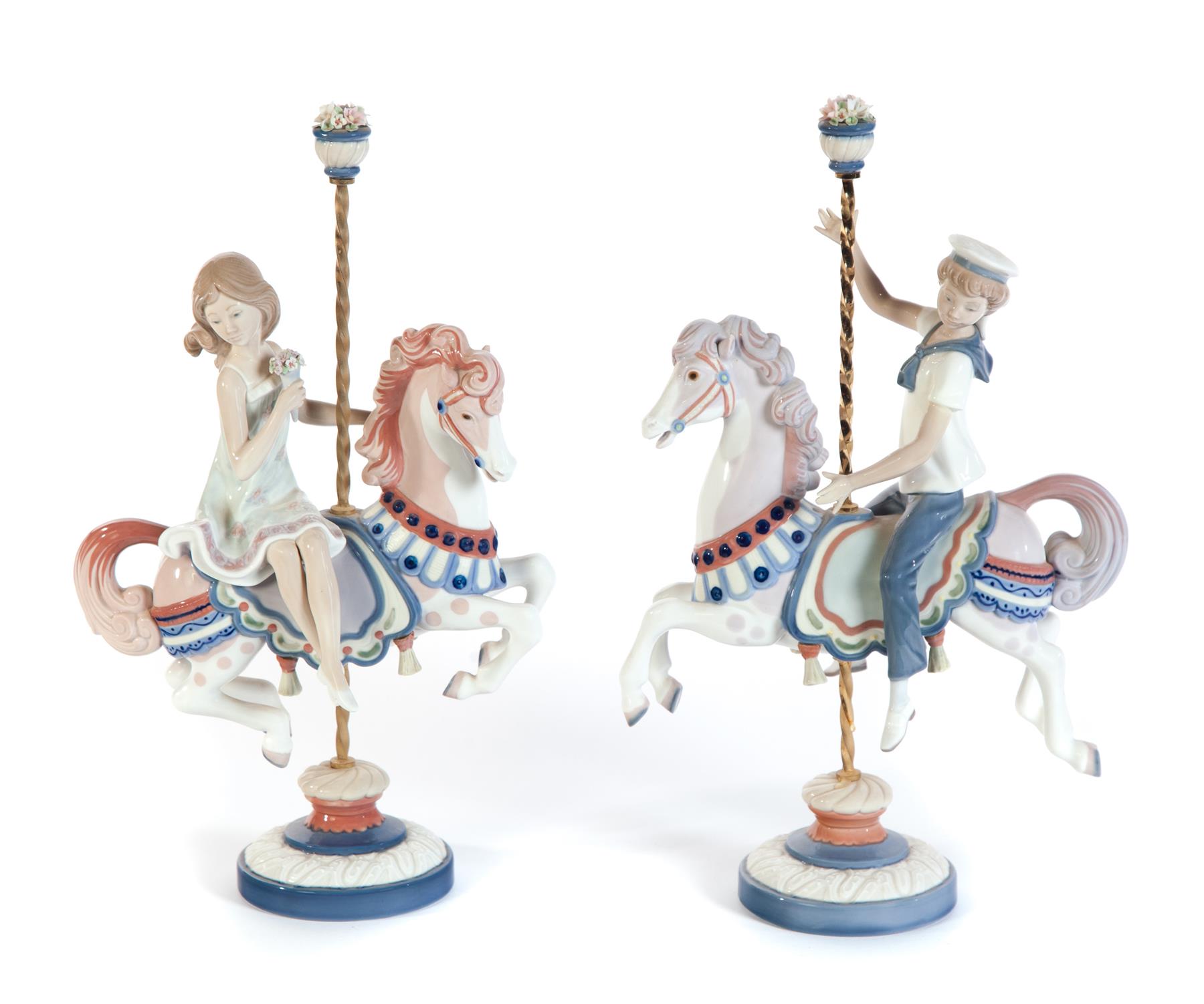 Appraisal: TWO LLADRO FIGURES OF YOUNG CHILDREN RIDING CAROUSEL HORSES Spain