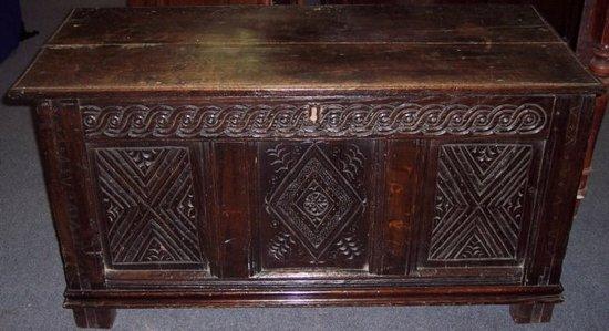 Appraisal: A carved oak chest cm wide