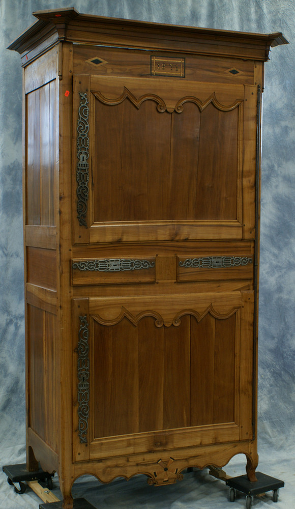 Appraisal: Inlaid and carved fruitwood French armoire with large doors and