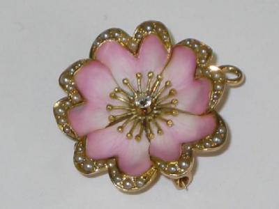 Appraisal: AN ENAMEL SEED PEARL AND DIAMOND BROOCH PENDANT having central