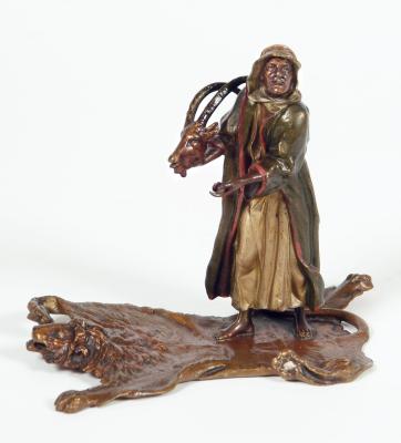 Appraisal: A BERGMAN COLD PAINTED BRONZE FIGURE of an Arab trader