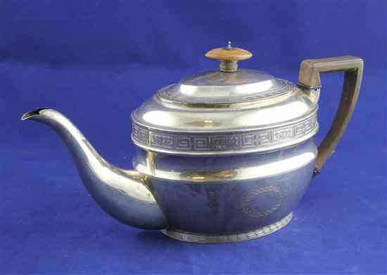 Appraisal: A George III provincial silver teapot of oval form with