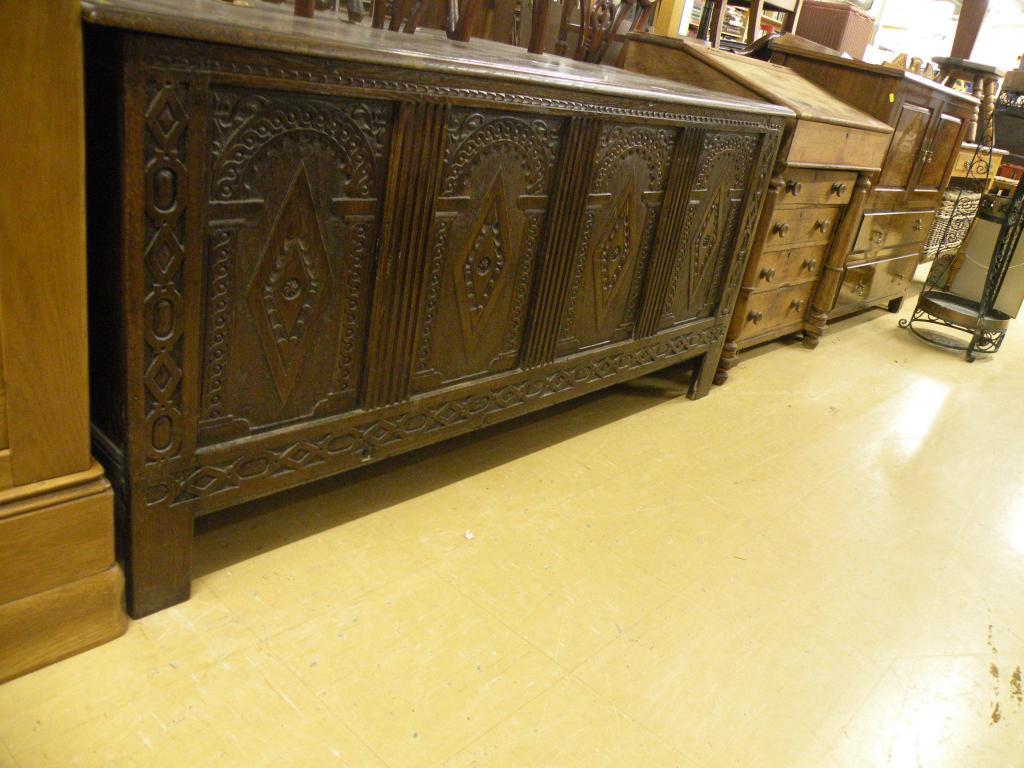 Appraisal: An thC oak coffer the hinged top with a moulded