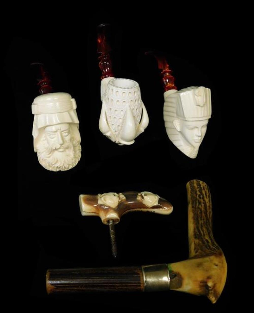 Appraisal: Three meerschaum pipes and two cane handles details include contemporary