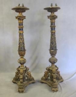 Appraisal: Pair of Impressive Italian Patinated and Carved Standards From a