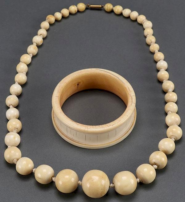 Appraisal: A CARVED IVORY JEWELRY GROUP CIRCA A CARVED IVORY JEWELRY