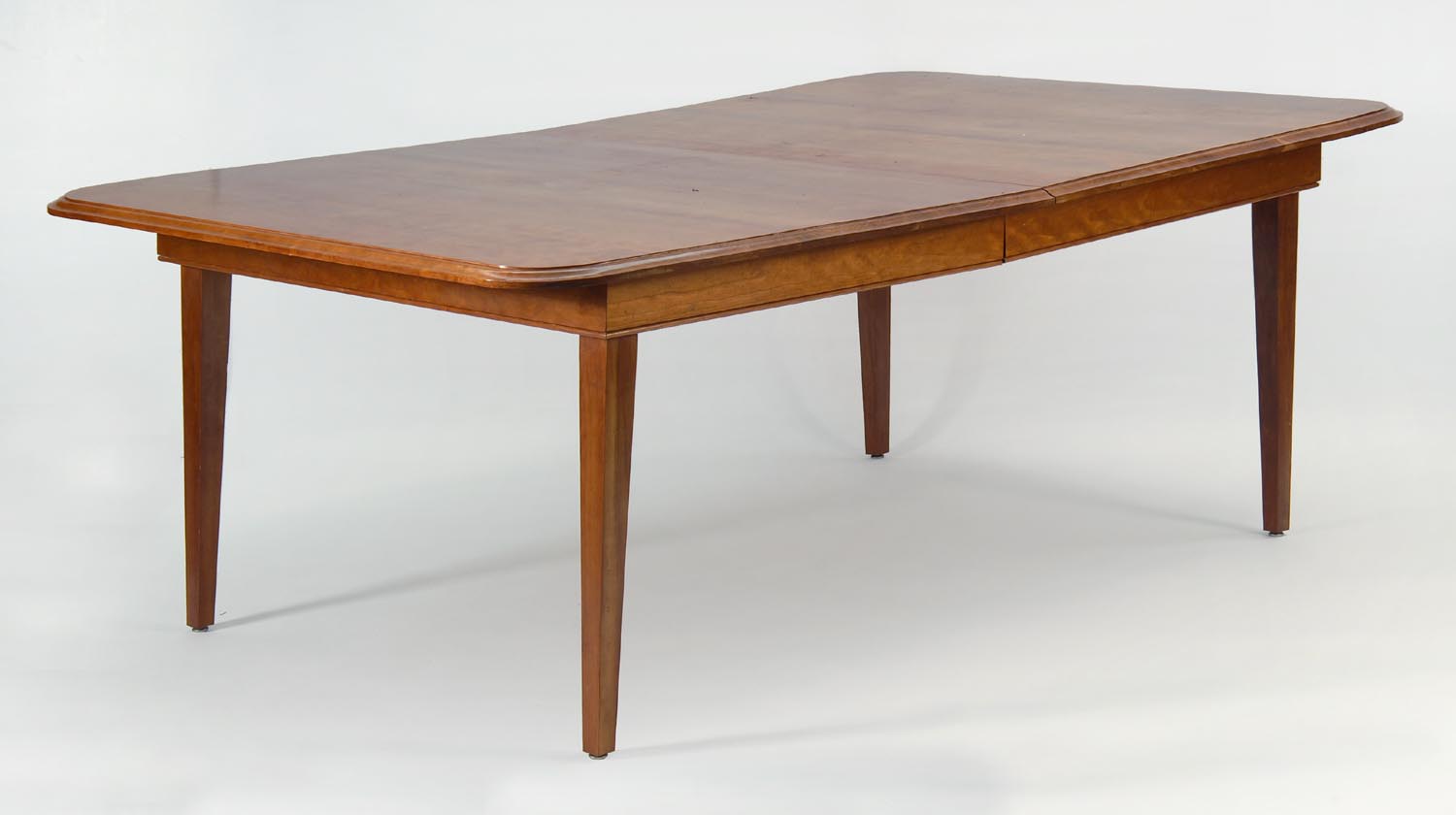 Appraisal: CONTEMPORARY DINING TABLE in cherry with tapered legs Height Width