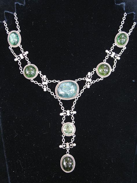 Appraisal: AN ARTS AND CRAFTS SILVER AND AVENTURINE NECKLACE of double