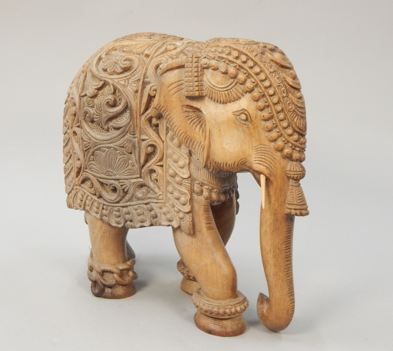 Appraisal: An Indian hardwood elephant carved with scrolls etc cm high