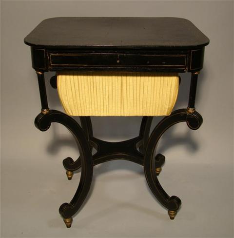 Appraisal: REGENCY SEWING STAND WITH SLIDING UNDERBASKET the black painted table