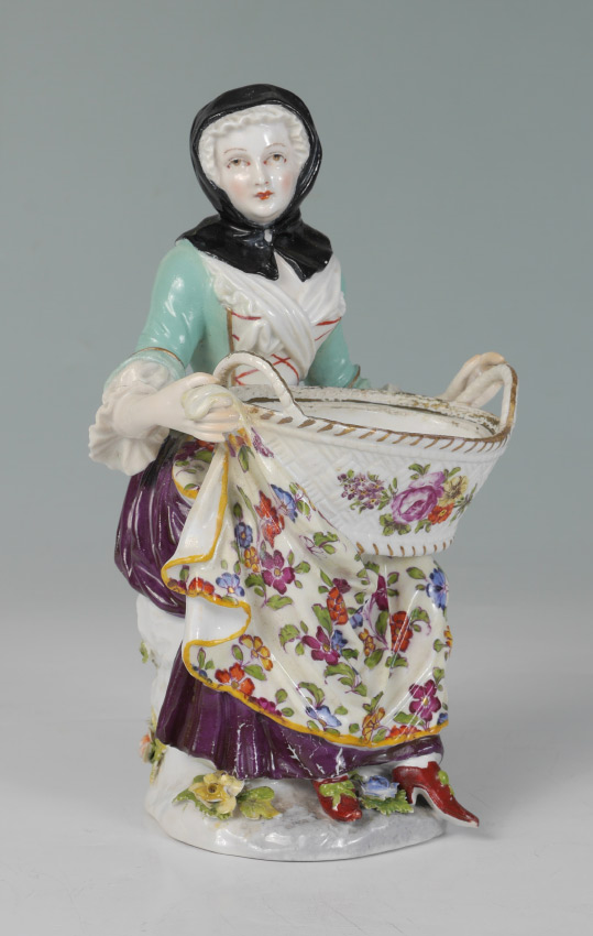 Appraisal: MEISSEN FIGURE OF A SEATED WOMAN WITH BASKET Figure of