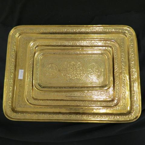 Appraisal: Persian Brass Trays elaborate designs largest is across all polished