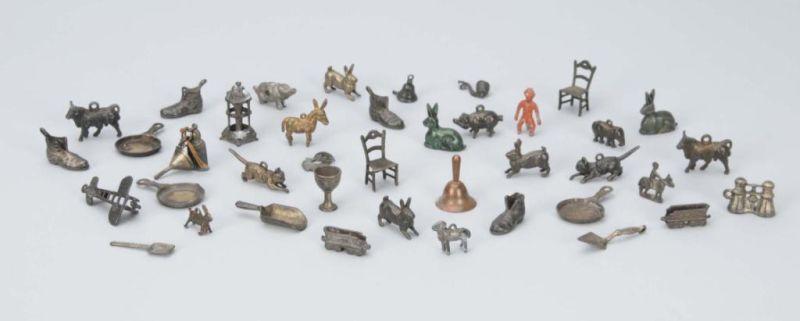 Appraisal: Lot of Metal Cracker Jack Prize Figures Description Different objects