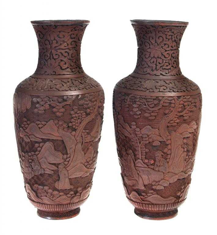 Appraisal: A PAIR OF CHINESE CINNABAR LACQUER VASES carved with scenes