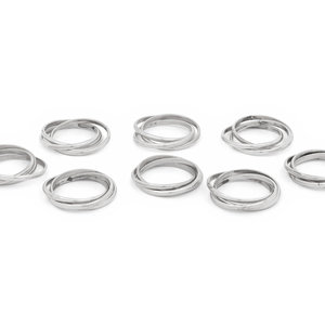 Appraisal: Two Cased Sets of Four Cartier Trinity Silver Napkin Rings