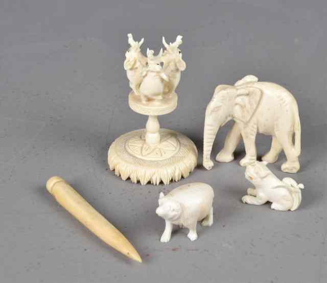 Appraisal: Pcs Chinese Carved Ivory AnimalsTo include three elephants standing on