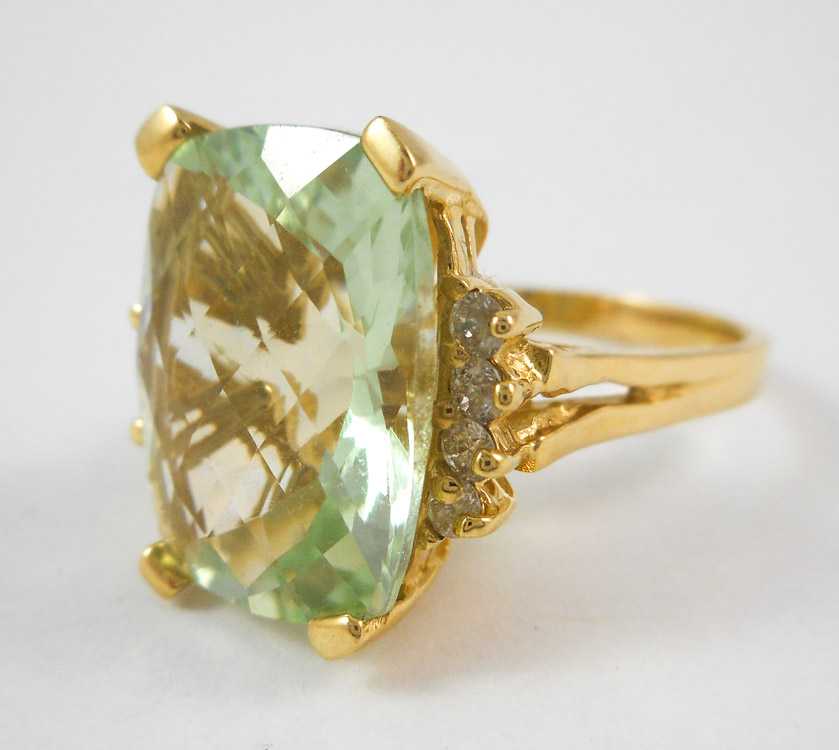 Appraisal: PRASIOLITE DIAMOND AND FOURTEEN KARAT GOLD RING with four round-cut