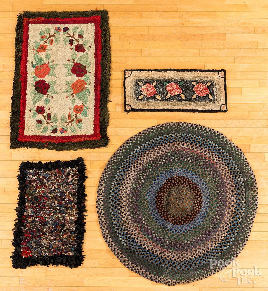 Appraisal: Three hooked rugs early th th c Three hooked rugs